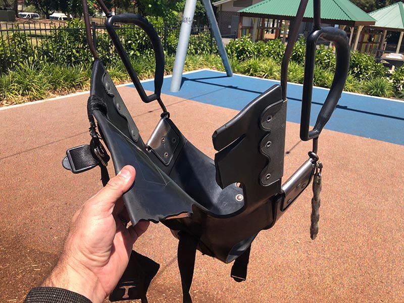 Playground Inspection uncovering damaged dangerous play equipment